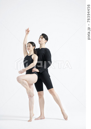 male and female couple modern contemporary dancers making moves in white background setting male and female couple modern contemporary dancers making moves in white background setting 76394456