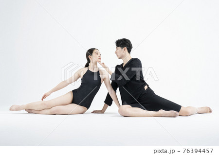 male and female couple modern contemporary dancers making moves in white background setting 76394457
