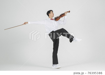 Asian female contemporary dancer with violin Asian female contemporary dancer with violin 76395386