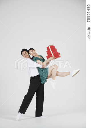 sale promotion concept, contemporary female dancer with shopping gift box sale promotion concept, contemporary female dancer with shopping gift box 76395430