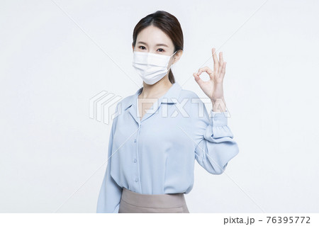 Asian woman business concept with mask 76395772