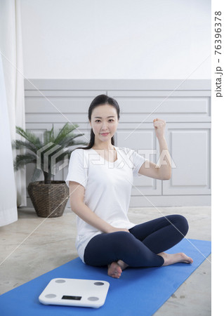 woman on diet, home training and work out concept 76396378