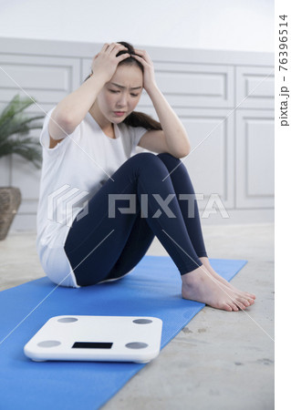 woman on diet, home training and work out concept woman on diet, home training and work out concept 76396514