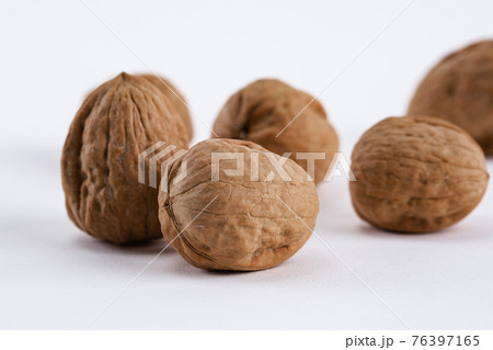walnuts on white background 76397165