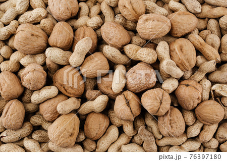 background of peanuts and walnuts background of peanuts and walnuts 76397180