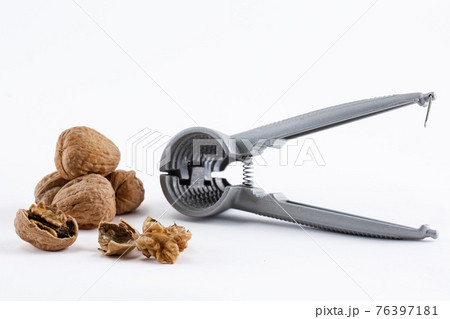 walnuts and nutcracker walnuts and nutcracker 76397181