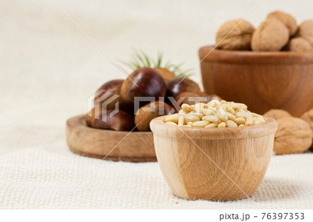 pine nuts, walnuts and chestnuts pine nuts, walnuts and chestnuts 76397353