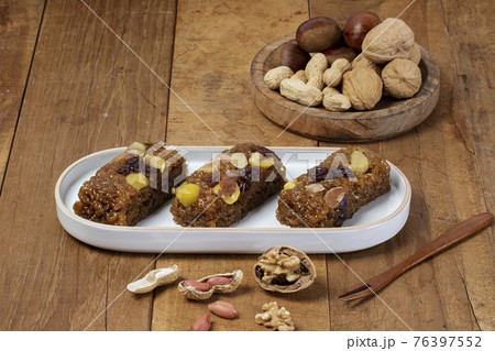 Yakbap, Korean dessert flavored glutinous rice mixed with honey, dates, chestnuts 76397552