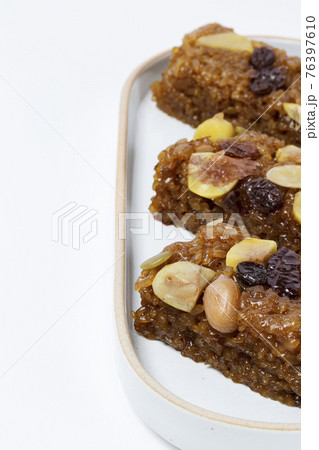 Yakbap, Korean dessert flavored glutinous rice mixed with honey, dates, chestnuts 76397610