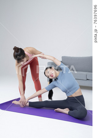 two fit Asian young women home training concept wearing sports top