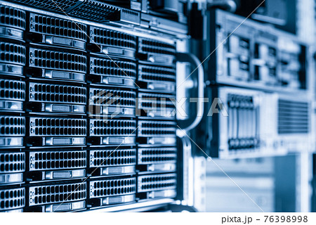 Cluster of data storage hard drives inside server room Cluster of data storage hard drives inside server room 76398998