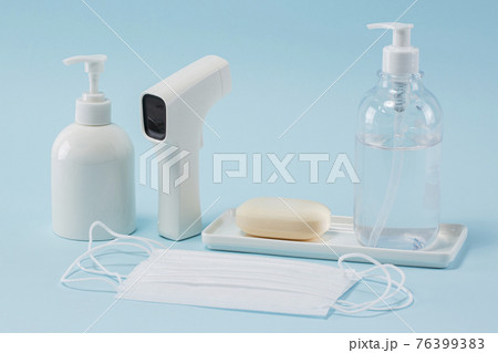 mask, hand sanitizer, thermometer and soap 76399383