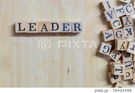 Leader concept idea, wooden letters connect to message on wooden desk, informative and communication about leaders of thought, work, initiative or learning for success, on top-view and copy space Leader concept idea, wooden letters connect to message on wooden desk, informative and communication about leaders of thought, work, initiative or learning for success, on top-view and copy space 76403498