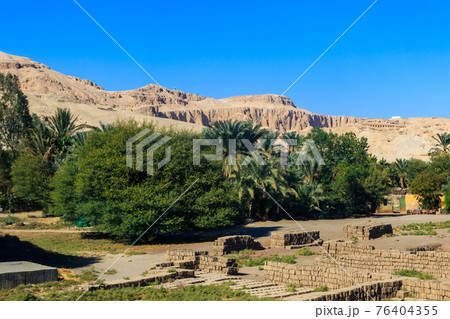 View of mountains and green trees in Luxor, Egypt View of mountains and green trees in Luxor, Egypt 76404355