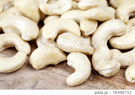 delicious and healthy raw cashew nuts, close up delicious and healthy raw cashew nuts, close up 76406752