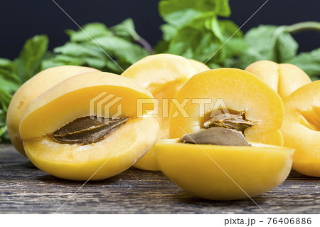 natural ripe and delicious and sliced orange apricots 76406886