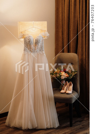 perfect white wedding dress on the wedding day 76407203