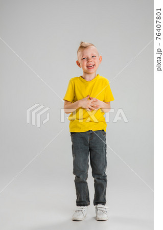 Happy boy isolated on white studio background. Looks happy, cheerful, sincere. Copyspace. Childhood, education, emotions concept Happy boy isolated on white studio background. Looks happy, cheerful, sincere. Copyspace. Childhood, education, emotions concept 76407801