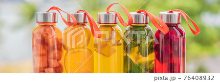 BANNER, LONG FORMAT Cambucha with various fruits arranged in the form of a rainbow. Homemade fermented raw kombucha tea with different flavorings. Healthy natural probiotic flavored drink. LGBT BANNER, LONG FORMAT Cambucha with various fruits arranged in the form of a rainbow. Homemade fermented raw kombucha tea with different flavorings. Healthy natural probiotic flavored drink. LGBT 76408932