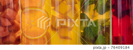 BANNER, LONG FORMAT Cambucha with various fruits arranged in the form of a rainbow. Homemade fermented raw kombucha tea with different flavorings. Healthy natural probiotic flavored drink. LGBT BANNER, LONG FORMAT Cambucha with various fruits arranged in the form of a rainbow. Homemade fermented raw kombucha tea with different flavorings. Healthy natural probiotic flavored drink. LGBT 76409184