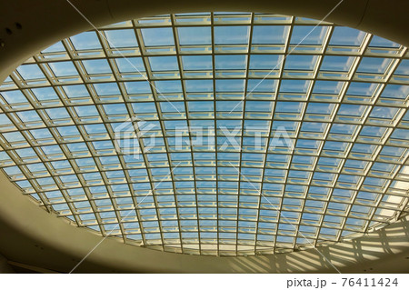 View of the glass transparent roof of the building. View of the glass transparent roof of the building. 76411424