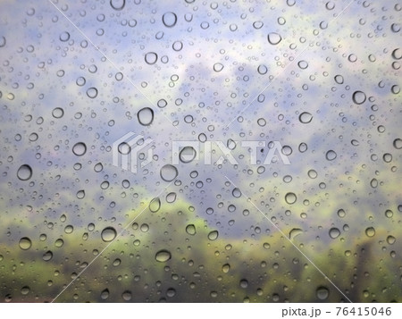 Close-up of water drops on glass surface as background Close-up of water drops on glass surface as background 76415046