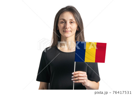 Happy young white girl holding Chad flag isolated on a white background 76417531