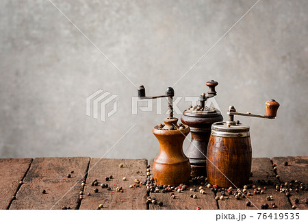Collection of vintage pepper mills with copyspace 76419535