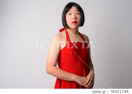 Portrait of young gay Asian man looking at camera Portrait of young gay Asian man looking at camera 76421746