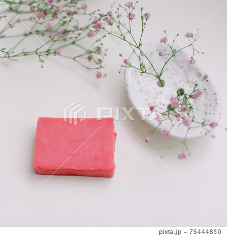 Natural handmade soap bar with ceramic soap dish and flowers, spa organic soap, sustainable lifestyle Natural handmade soap bar with ceramic soap dish and flowers, spa organic soap, sustainable lifestyle 76444850