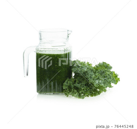 A healthy vegan drink green kale smoothie A healthy vegan drink green kale smoothie 76445248