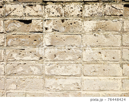 Old weathered stone block, brick or sandstone wall texture background Old weathered stone block, brick or sandstone wall texture background 76448424