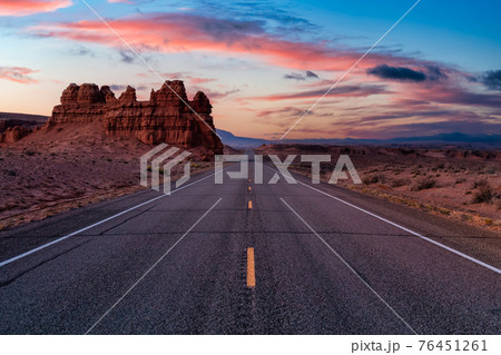 Middle of the Road View of a Scenic route in the desert. Middle of the Road View of a Scenic route in the desert. 76451261
