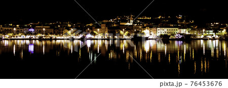 Croatian town by night - Makarska Croatian town by night - Makarska 76453676