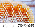 Fresh honey in honeycombs 76454645