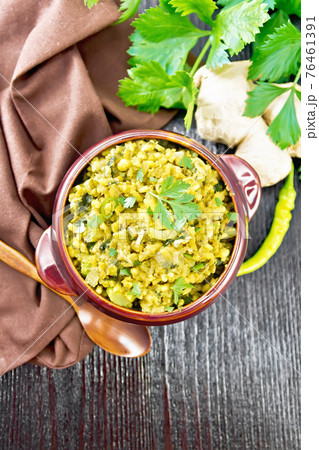 Kitchari in bowl on black board top 76461391