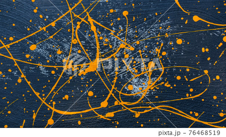 abstract oil color yellow color splatter paint on dark blue texture background. color paint texture background design 76468519