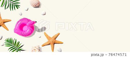 Summer concept with a pink flamingo float Summer concept with a pink flamingo float 76474571