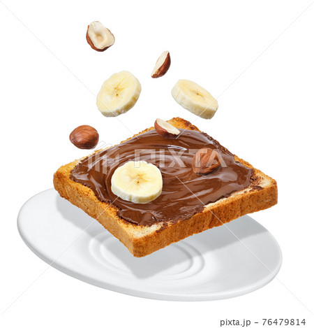 flying bread with chocolate cream isolated on white 76479814