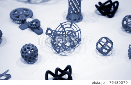 Many abstract models printed by 3d printer close-up. Many abstract models printed by 3d printer close-up. 76480079