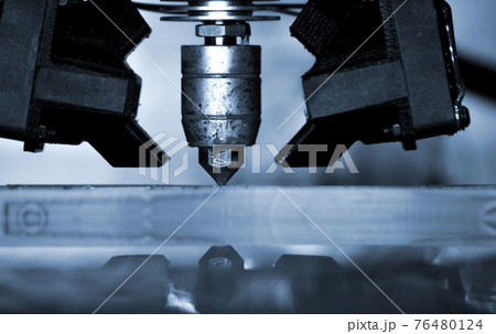 3D printer print isolated objects on mirror reflective surface close-up. 76480124