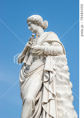 Ancient statue of a sensual renaissance era woman with musical instruments as pipes, in Potsdam, Germany Ancient statue of a sensual renaissance era woman with musical instruments as pipes, in Potsdam, Germany 76484300