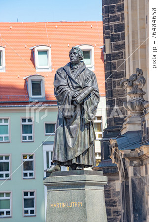 Monument of Martin Luther at  Neumarkt square in downtown of Dresden, a theologist, composer, priest, who has started Reformation in Catholic Church, Germany, details, closeup.. 76484658
