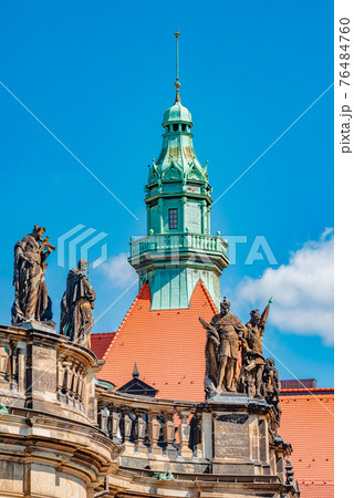 Historical center and colorful old buildings with red roofs and many religious statues in downtown of Dresden in summer with blue sky, Germany, details, closeup. Historical center and colorful old buildings with red roofs and many religious statues in downtown of Dresden in summer with blue sky, Germany, details, closeup. 76484760