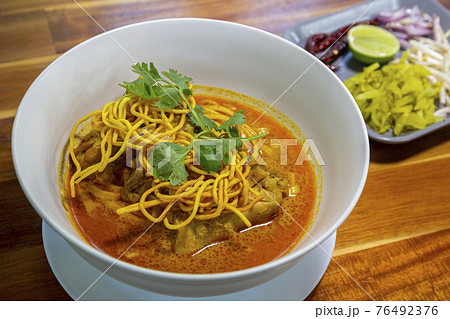 Khao Soi, Northern Thai curry noodle - famous Thai local traditional recipe Khao Soi, Northern Thai curry noodle - famous Thai local traditional recipe 76492376
