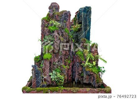 Mini fake waterfall cliffs on white background. Mini fake waterfall cliffs on white background. 76492723