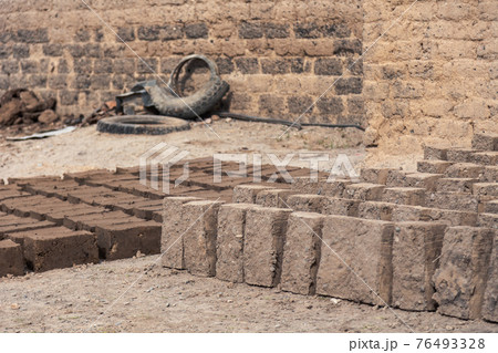 Production of clay brick in stacks, bricks are arranged on one by one 76493328