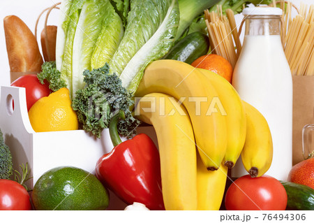 Grocery. box full of fruits and vegetables Grocery. box full of fruits and vegetables 76494306