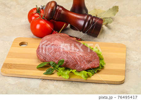 Raw beef piece for cooking Raw beef piece for cooking 76495417