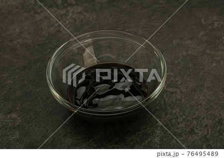 Asian cuisine - oyster sauce in the bowl Asian cuisine - oyster sauce in the bowl 76495489